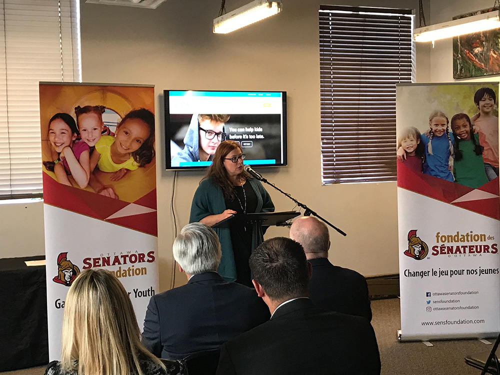 Senators Foundation making a presentation.