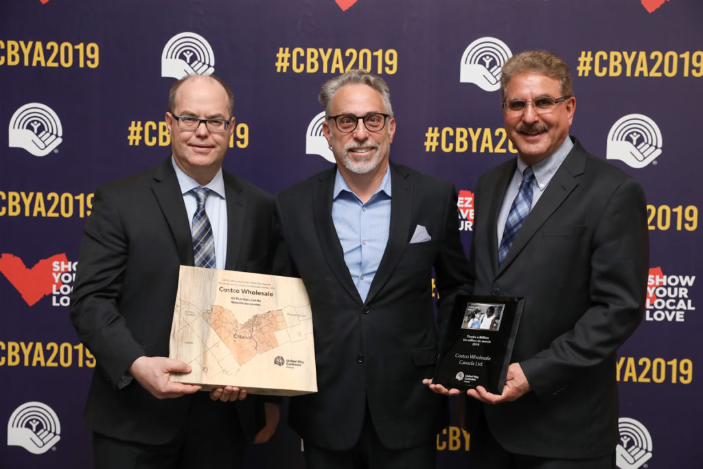A photo of Costco representatives receiving their CBYA Award.