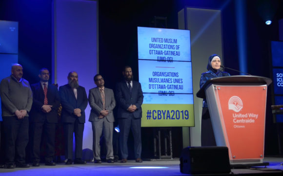 A photo of The United Muslim Organizations of Ottawa-Gatineau making a speech at the CBYA Gala.