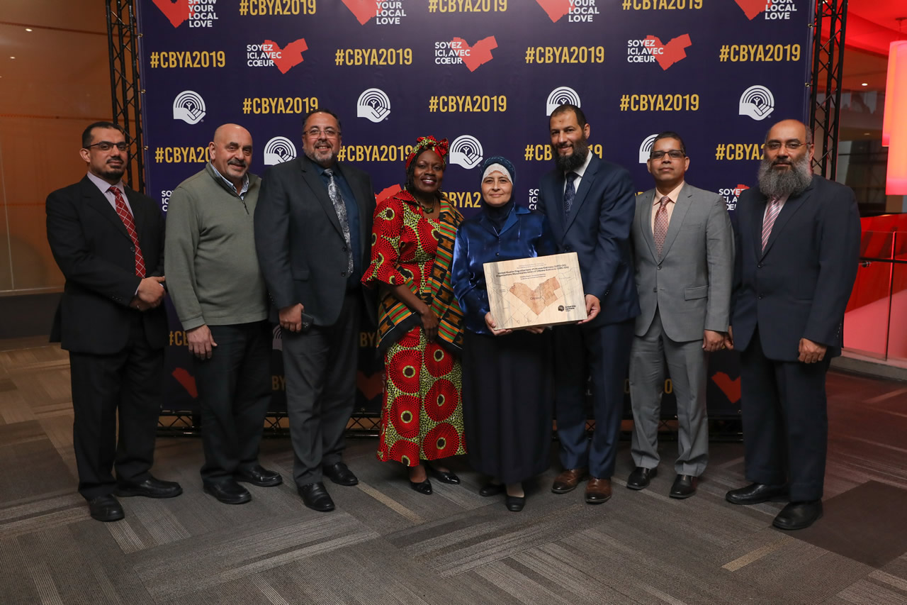 A photo of The United Muslim Organizations of Ottawa-Gatineau accepting their award at the CBYA Gala.